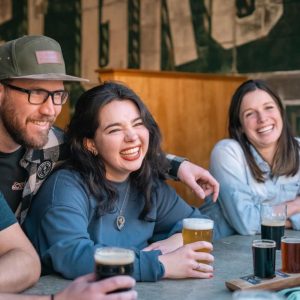 Customers drinking beer at Lost Grove Brewing