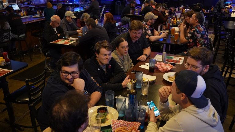 Busy restaurant with people dining together
